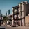 a row of buildings on a city street