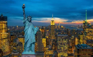 The Statue of Liberty over the Scene of New York City cityscape